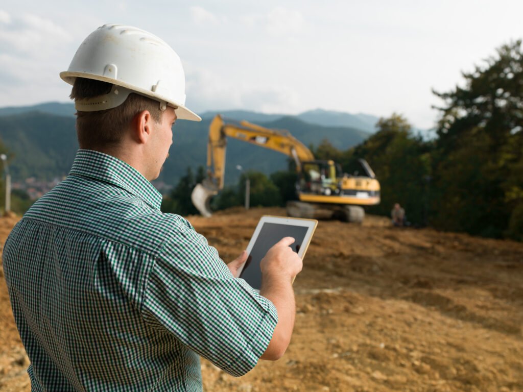 Site safety inspection using tablet on construction site