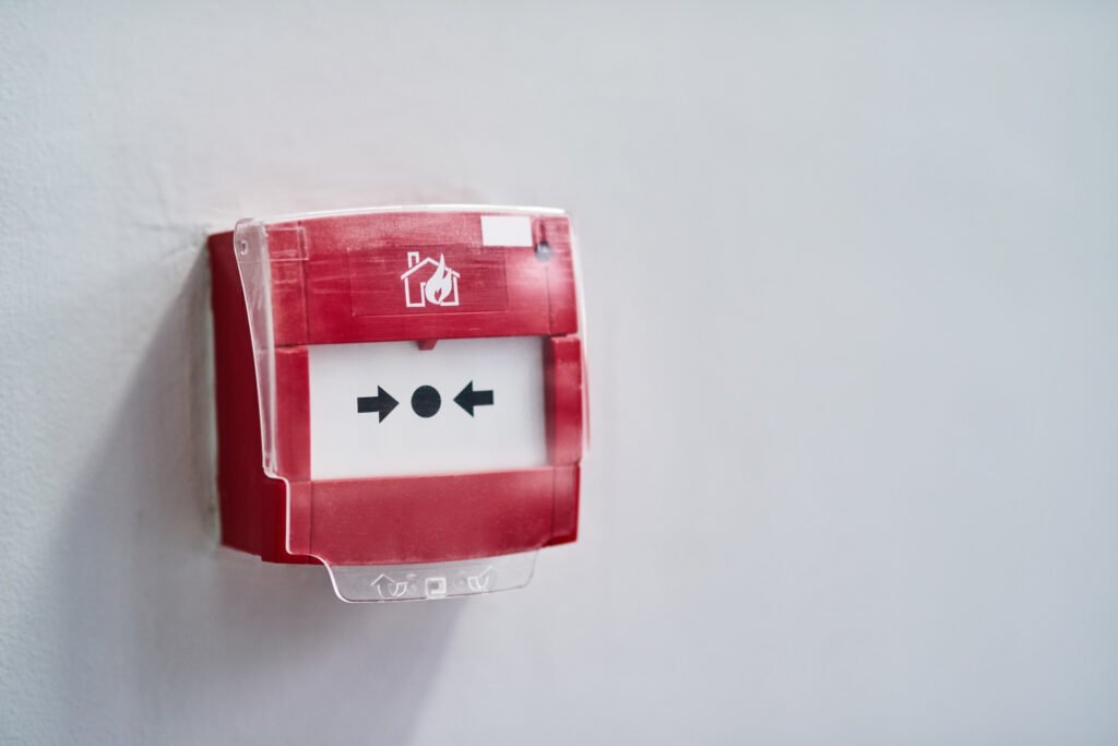 Fire alarm call point in commercial building
